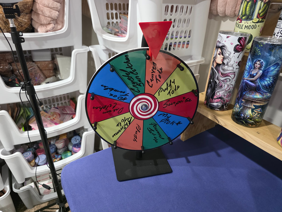 Tumbler Game with Spin of Wheel